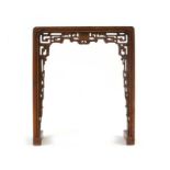 A late 19th/early 20th century Chinese stained and carved pine altar table, w.