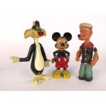 Two moulded plastic clockwork figures modelled as Mickey Mouse and Popeye,