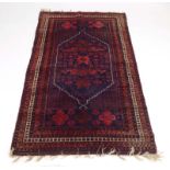 A mid-20th century woolen rug, presumably Turkish,