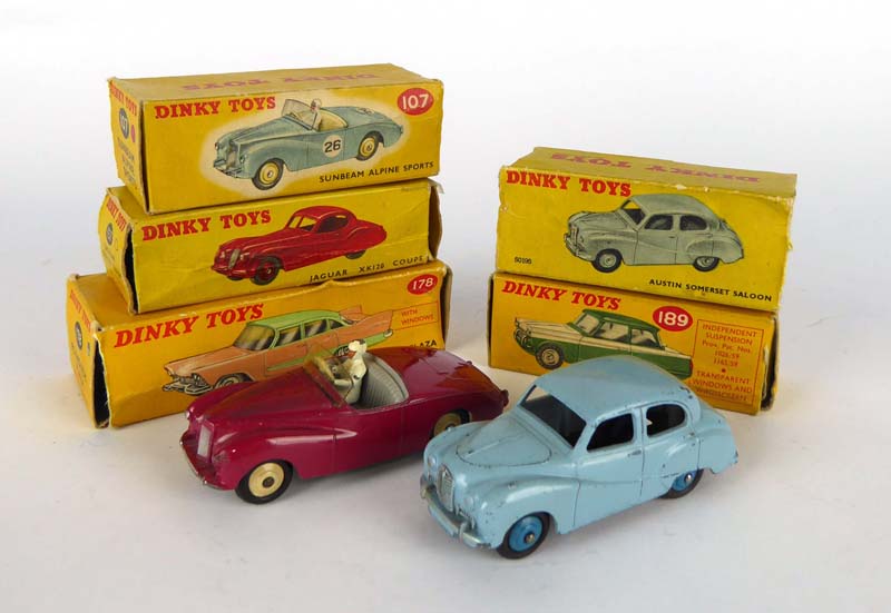 Five Dinky Toys models comprising: 40J Austin Somerset saloon, 107 Sunbeam Alpine sports,