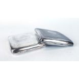 A silver and engine turned cigarette case of cushioned rectangular form, maker RN, Birmingham 1945,