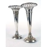 A pair of Edwardian pierced silver spill vases of flared form, Sheffield 1910, h.