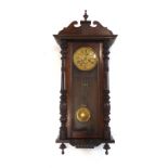 A late 19th century Vienna Regulator-type wall clock in a walnut case, h.