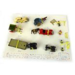 A small group of Britains 'Lilliput' items including vehicles, tractor,