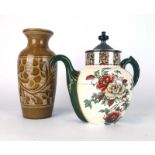 Doulton Burslem for J. J. Royle, a 'Self Pouring' teapot, h. 21.