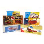 Fourteen Corgi Classics and other diecast vehicles each modelled as a fire engine,