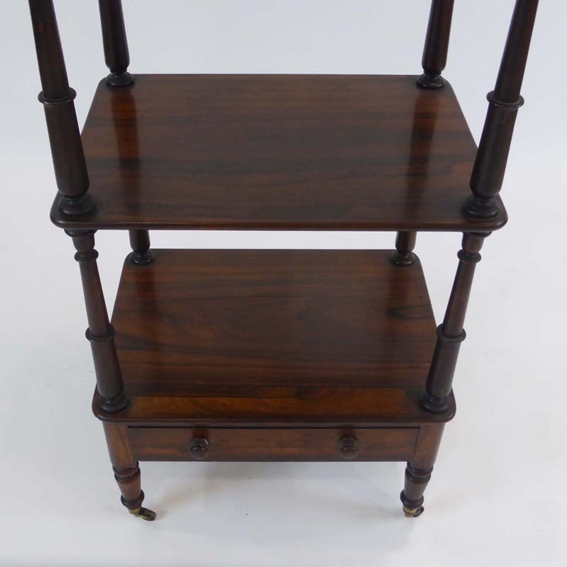 A 19th century rosewood four-tier what-not with a single drawer, turned support and castors, w. - Image 5 of 5