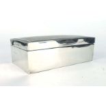 An early 20th century silver, parcel gilt and engine turned cigarette box of rectangular form,