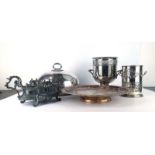 A small group of silver plated items including a two handled tray, a pair of serving tongs,