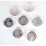 A group of seven silver proof coins from the Monarch's Silver Coin Collection