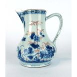 A late 18th century water jug of pear shaped form decorated in the Imari palette with bamboo and