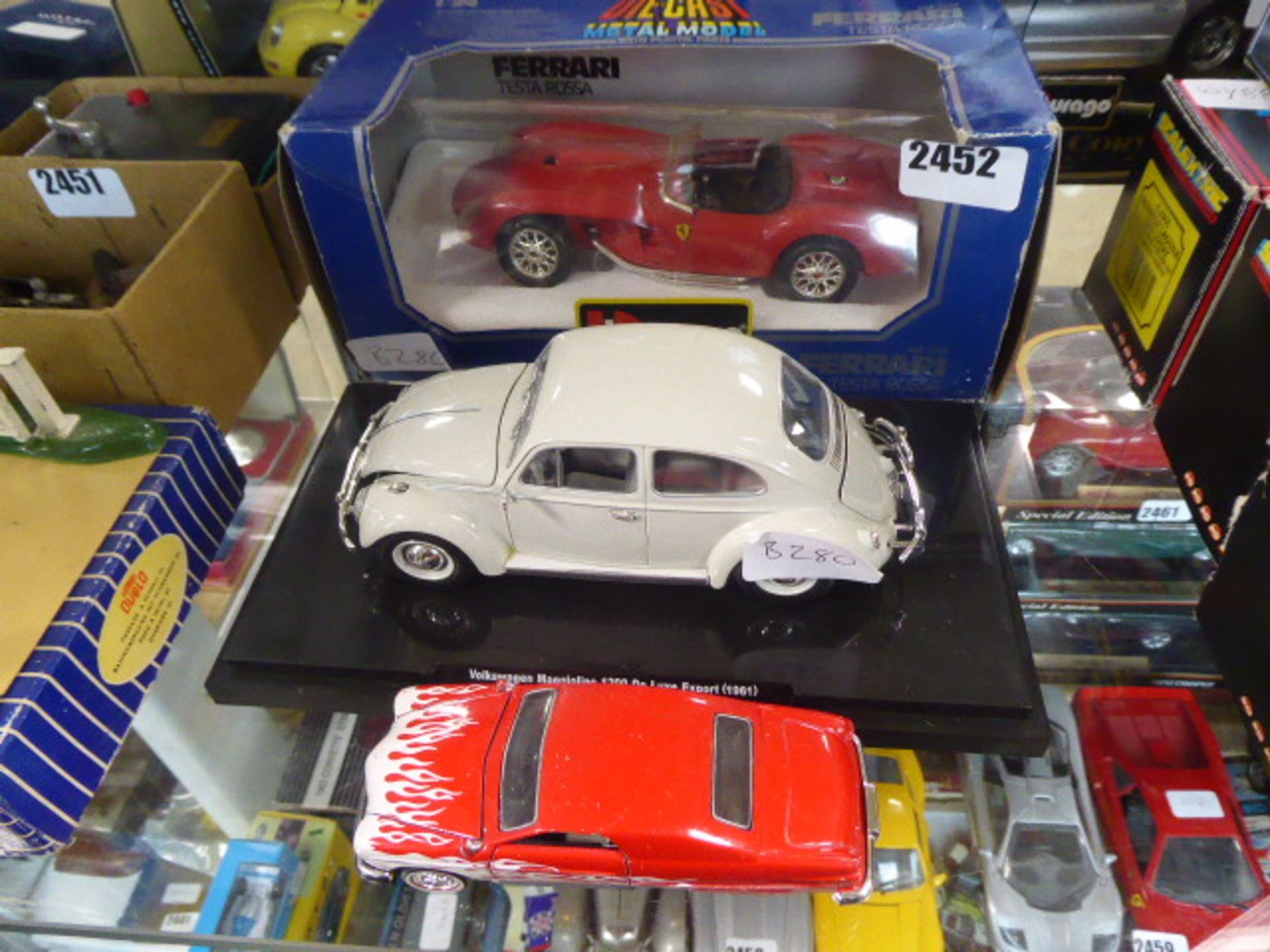 Collection of Diecast vehicles including 1:28 scale Burago Ferrari Testarossa