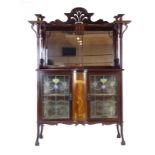 A late 19th/early 20th century mahogany sideboard decorated with Art Nouveau scrolls and marquetry,