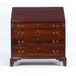 A George III mahogany and ebony strung bureau,