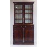 A 19th century mahogany and ebonised bookcase cabinet,