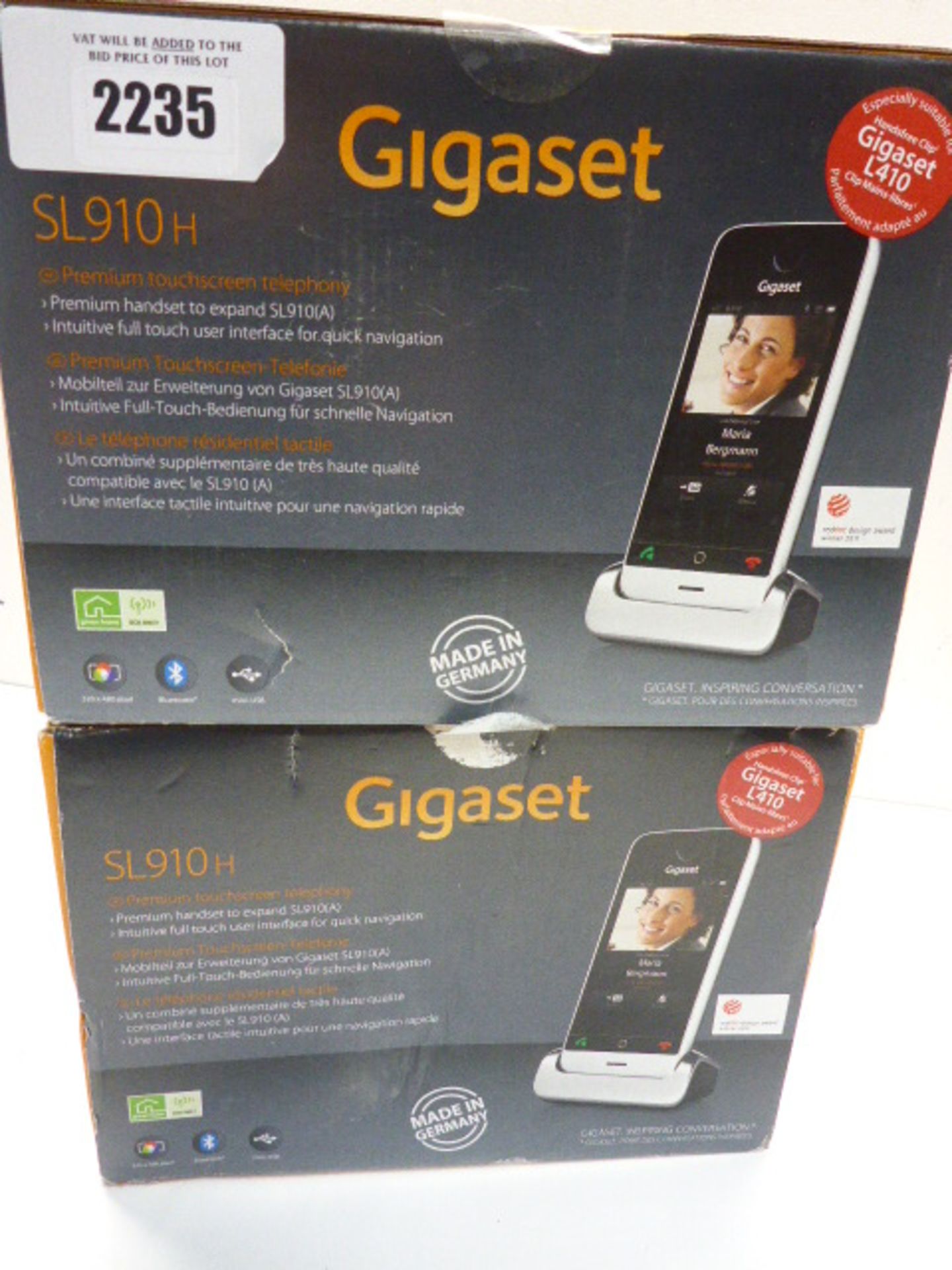 Two Gigaset SL910H phone handsets boxed.