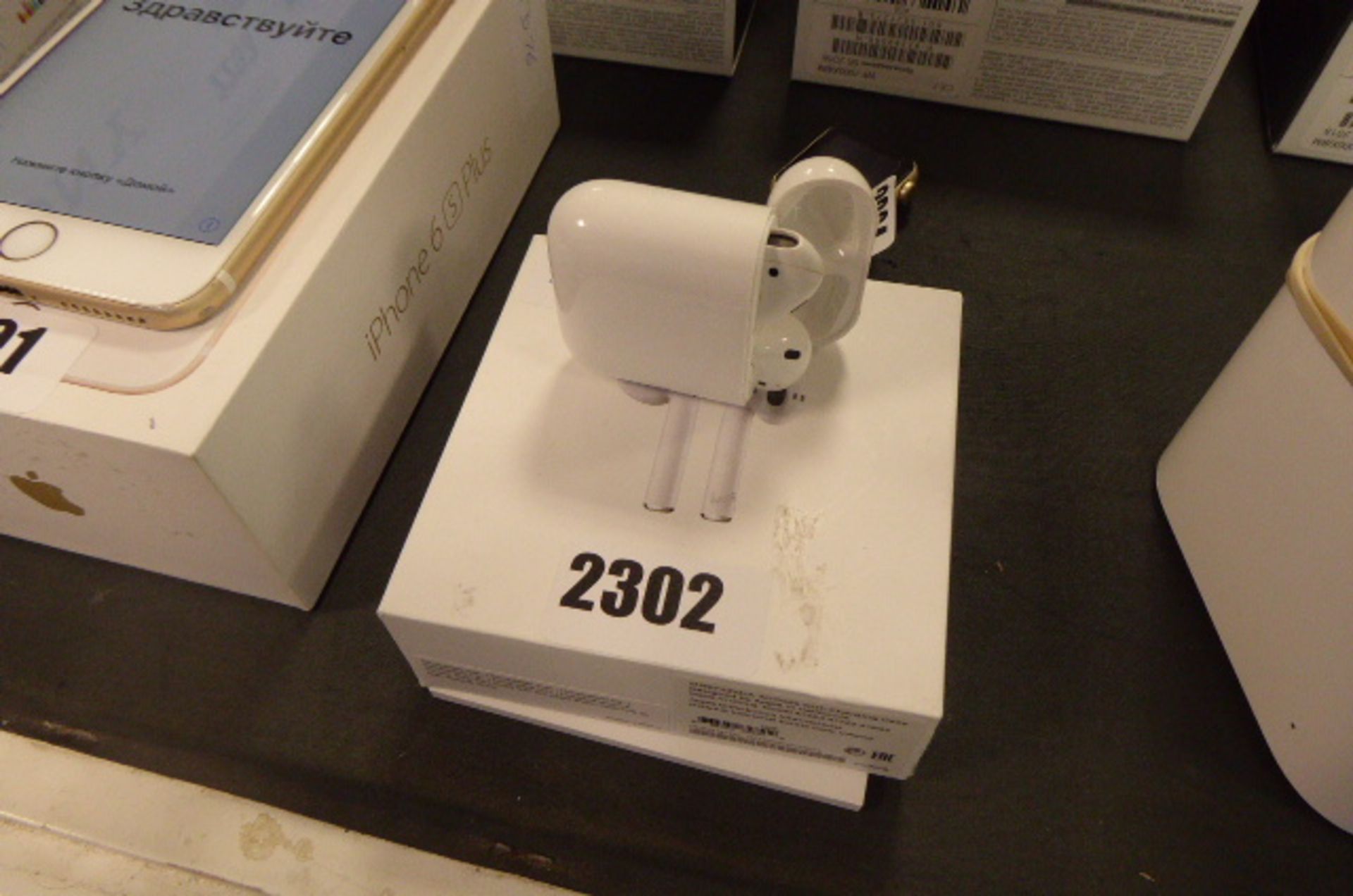 Pair of Apple air pods with charge case