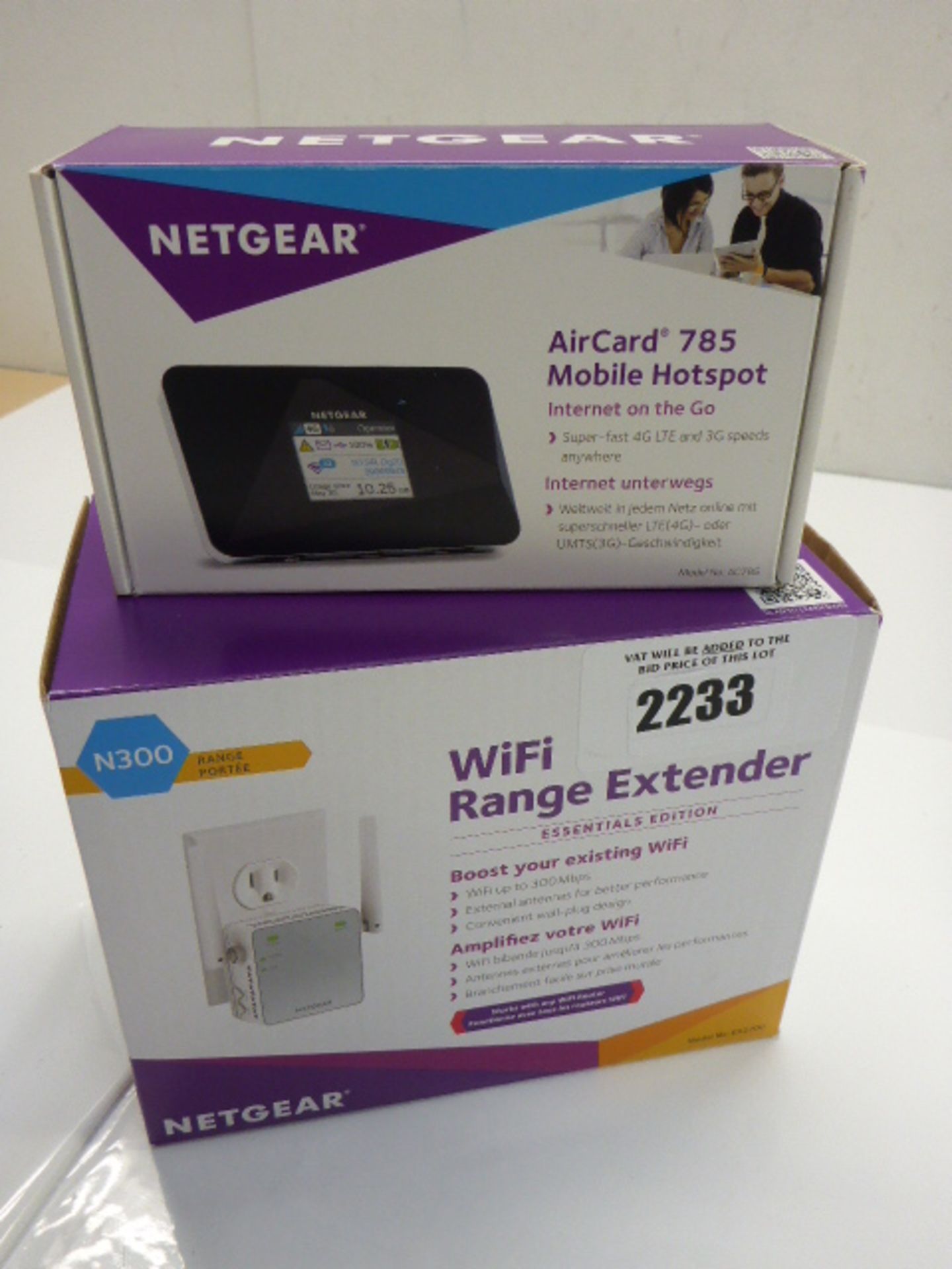 Netgear wi-fi range extender, and a Netgear Aircard 785.