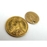 A Victorian shield back half sovereign dated 1890,