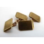 A pair of 9ct yellow gold cufflink's of rectangular bevelled form, hallmarked for Birmingham 1926,