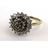 A 9ct yellow gold cluster ring set small emeralds and diamonds, ring size P, 3.