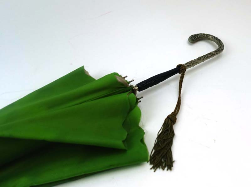 An early 20th century parasol with an ebonised shaft and metalwares handle - Image 3 of 3