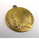 A George III guinea dated 1792,