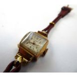 A ladies 18ct yellow gold manual wind wristwatch by Futura,