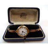 An early 20th century ladies 9ct yellow gold cased wristwatch,