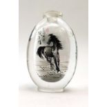 A Chinese clear glass snuff bottle internally decorated with a pony, signed, h.