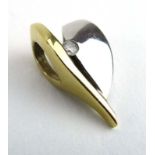 A 9ct two colour gold slider pendant of leaf shaped design set small diamond, l. 17 cm, 2.