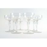 A set of eight early 20th century clear glass champagne saucers/coupes, h. 14.