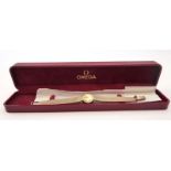 A ladies 9ct yellow gold cased manual wind wristwatch by Omega,