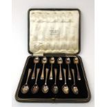 A cased set of twelve silver old English pattern coffee spoons, maker CB&S,