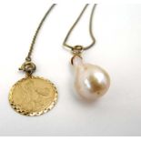 A silver gilt snakelink necklace suspending a baroque pearl pendant,