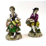 A pair of 18th century-style porcelain figures modelled as a dandy and his female companion on