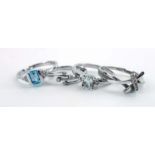 Four 9ct white gold dress rings set small diamonds and blue coloured stones, various sizes,