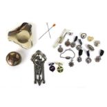 A group of collectables including silver sporting badges, a silver-bladed fruit knife,