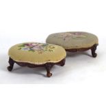 A pair of Victorian mahogany and needlework footstools