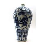 A Chinese blue and white stoneware vase of octagonal baluster form decorated with elders and