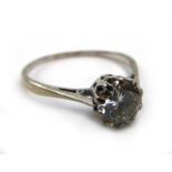 An 18ct white gold ring set brilliant cut diamond in a ten claw setting, stone approximately 1.