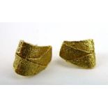 A pair of yellow metal ear studs of leaf design, overall 3.