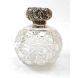 A silver mounted hobnail cut dressing table bottle of spherical form, Chester hallmarks, h.