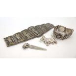 A parcel of silver and metalware jewellery comprising a brooch in the form of a terrier,