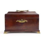 A mid-18th century mahogany and rosewood crossbanded tea caddy on gilt metal bracket feet, w.