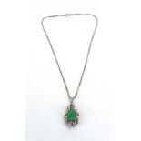 A 14ct white gold boxlink necklace suspending an illusion openwork pendant set jade, overall 9.