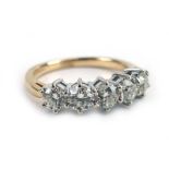 An 18ct yellow gold half eternity ring set five brilliant cut diamonds each in a six claw setting,