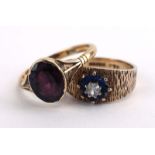 An 18ct yellow gold ring set oval purple coloured glass in a rubover setting, ring size Q 1/2, 3.