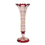 A 19th century Bohemian ruby flash glass vase of flared canted form, h. 32.