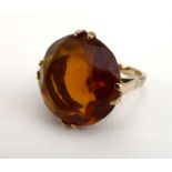 A 9ct yellow gold dress ring set circular citrine in a four claw setting, ring size M 1/2, 6.
